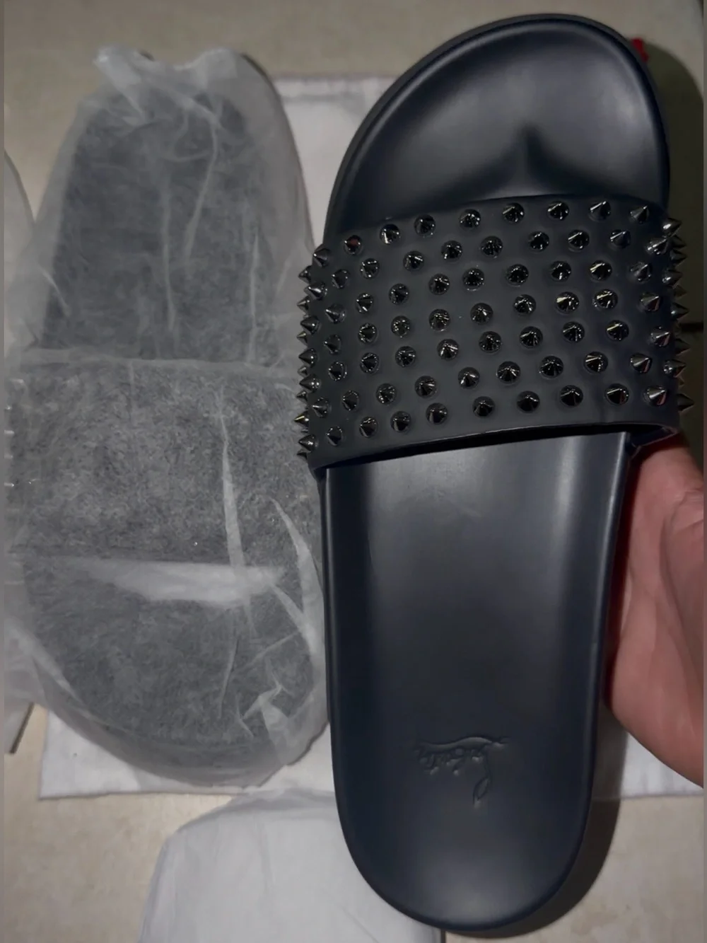 Christian Louboutin spiked red bottom slides